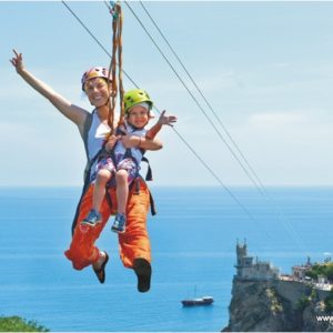 The zip line at the Swallow’s Nest (Crimea, Big Yalta) 400m in length The zip line at the Swallow's Nest (Crimea, Big Yalta) 400m in length